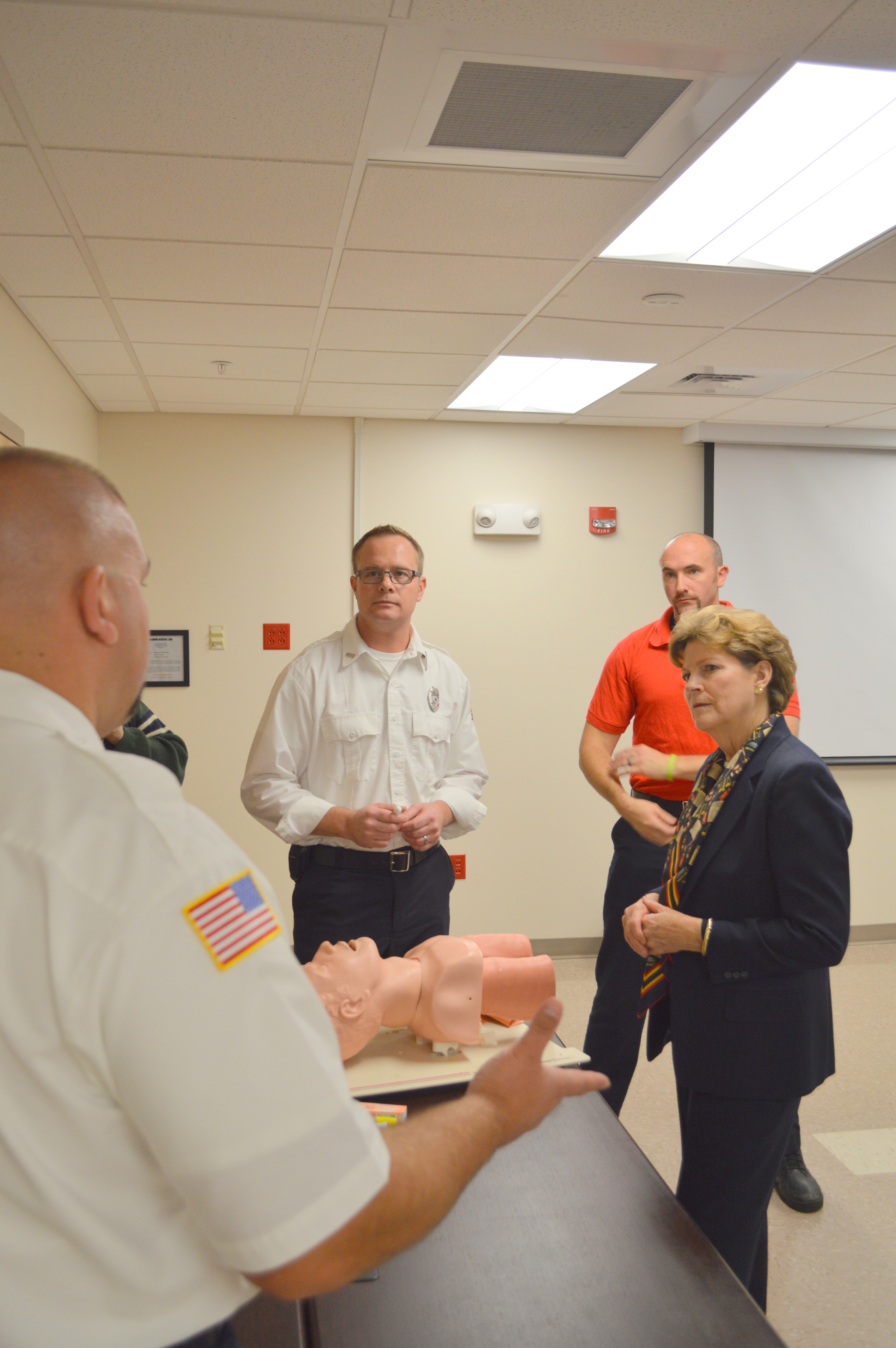 Senator Shaheen participates in a demonstration on how Naloxone is administered. 
