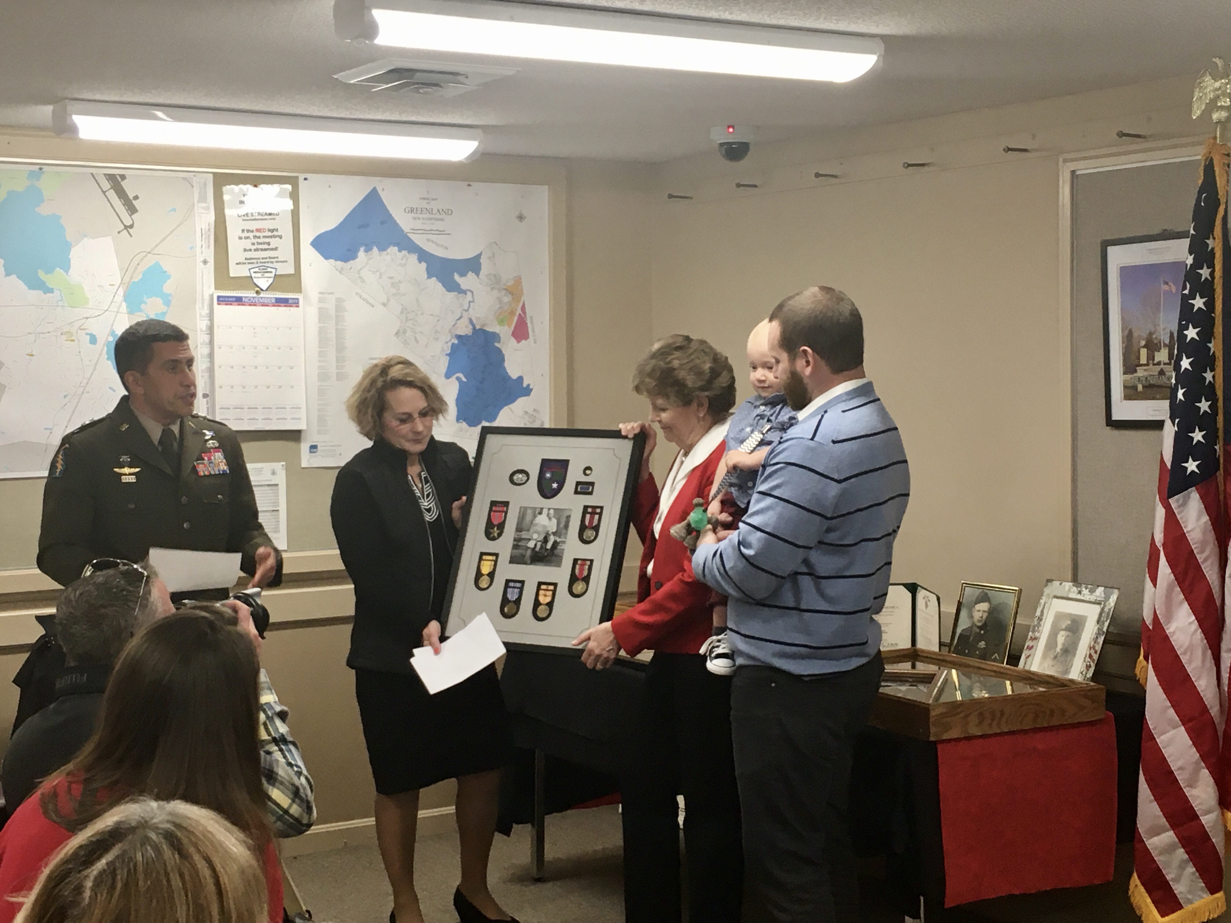 Shaheen with World War II veteran Ralph Noveletsky’s daughter, grandson and great-grandson, and General David J. Mikolaities, The Adjutant General, New Hampshire